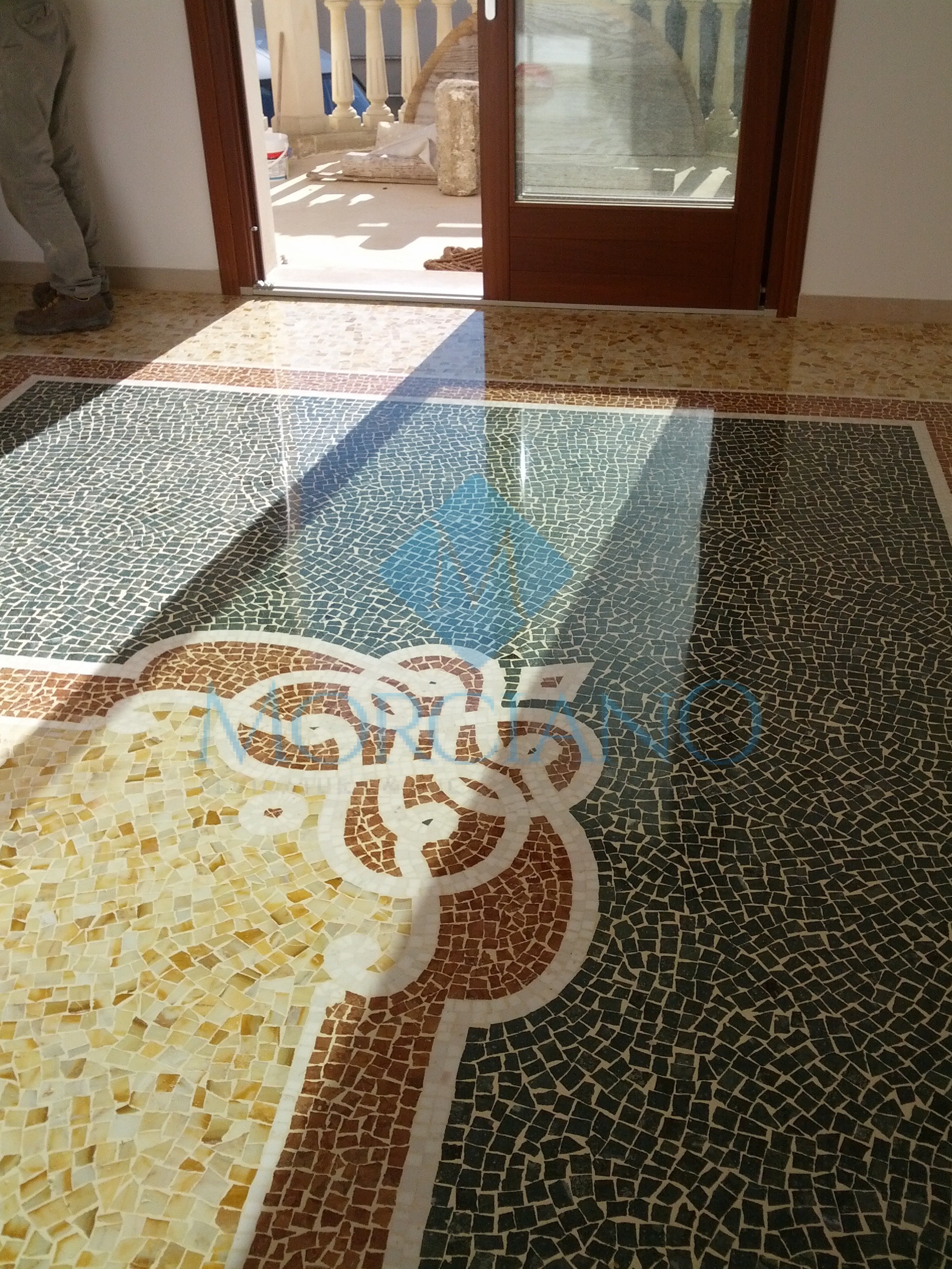 Pavimento con mosaico